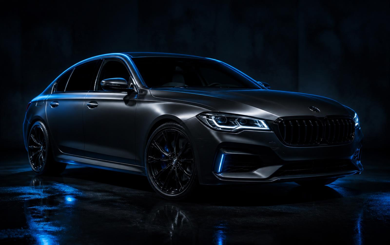 Premium executive sedan lit with blue accents in a dark studio